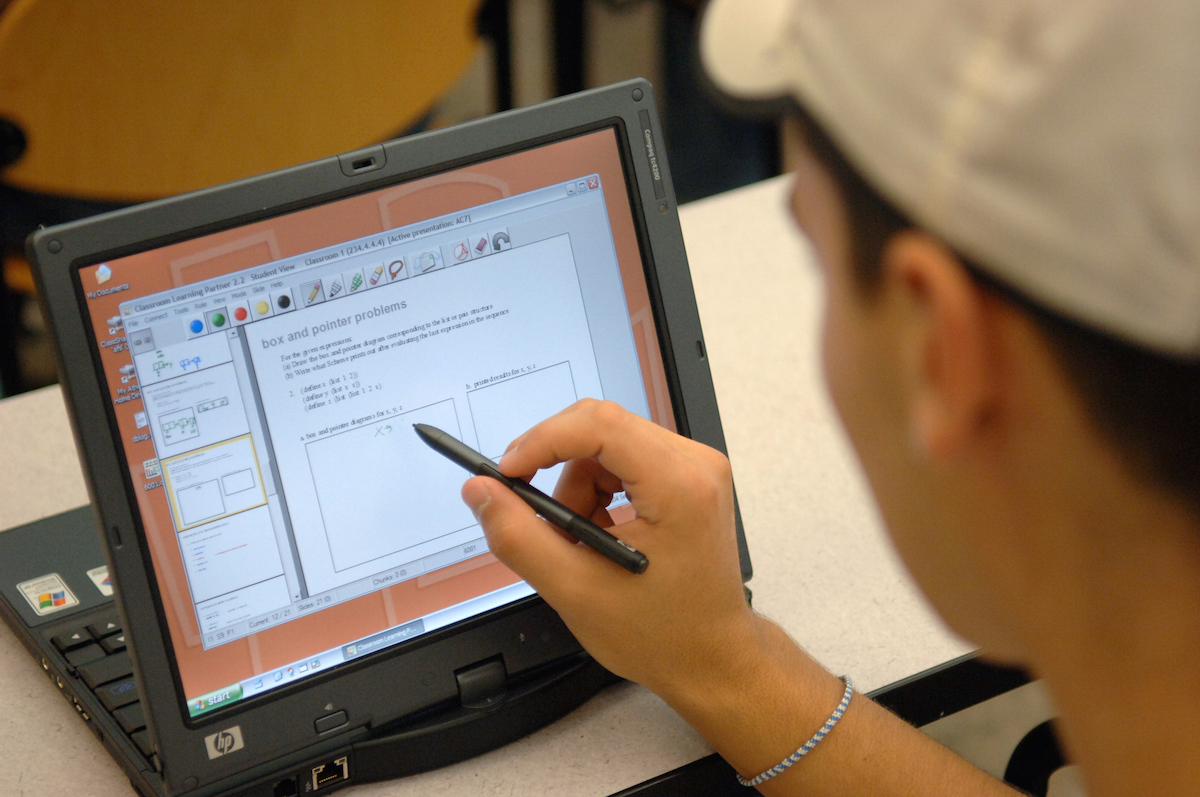 Student working on pen tablet